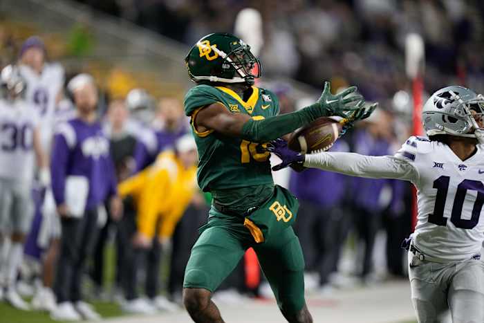 Nov 12, 2022; Waco, Texas, USA; Kansas State Wildcats cornerback Jacob Parrish (10) breaks up a pass intended for Baylor Bears wide receiver Hal Presley (16) during the second half at McLane Stadium. Mandatory Credit: Chris Jones-USA TODAY Sports